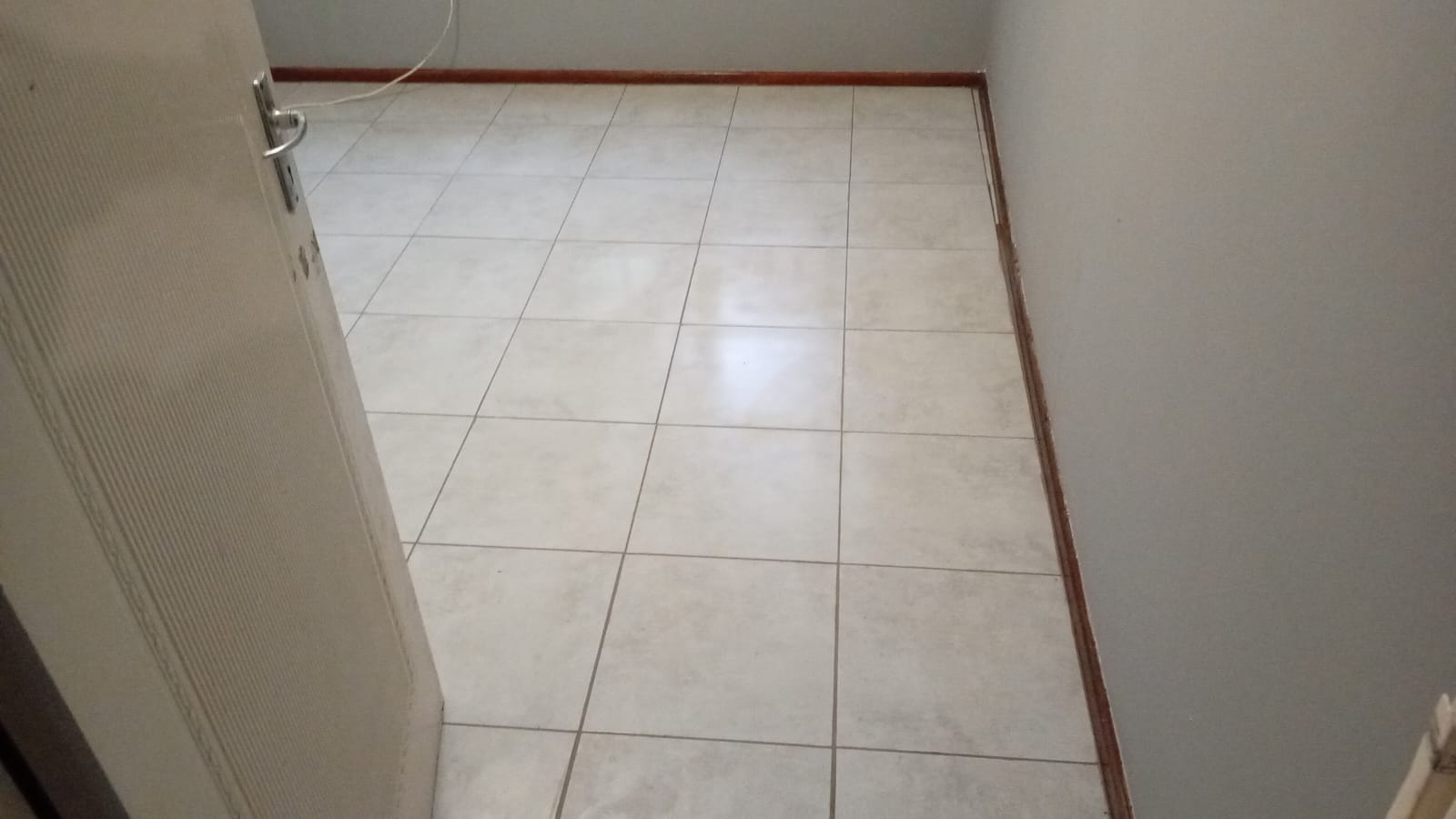 Neatly tiled floor completed by Africa Works