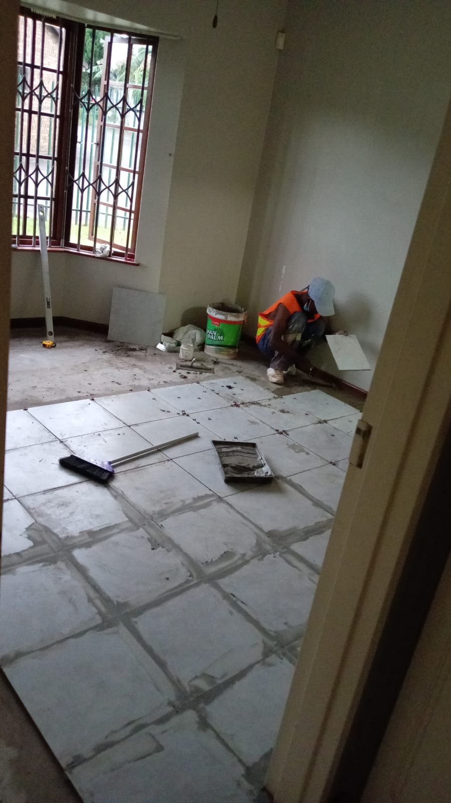 Room mid-tiling before Africa Works completed the floor